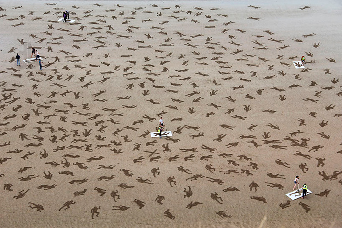 9 тысяч рисунков на песке (фото 1)