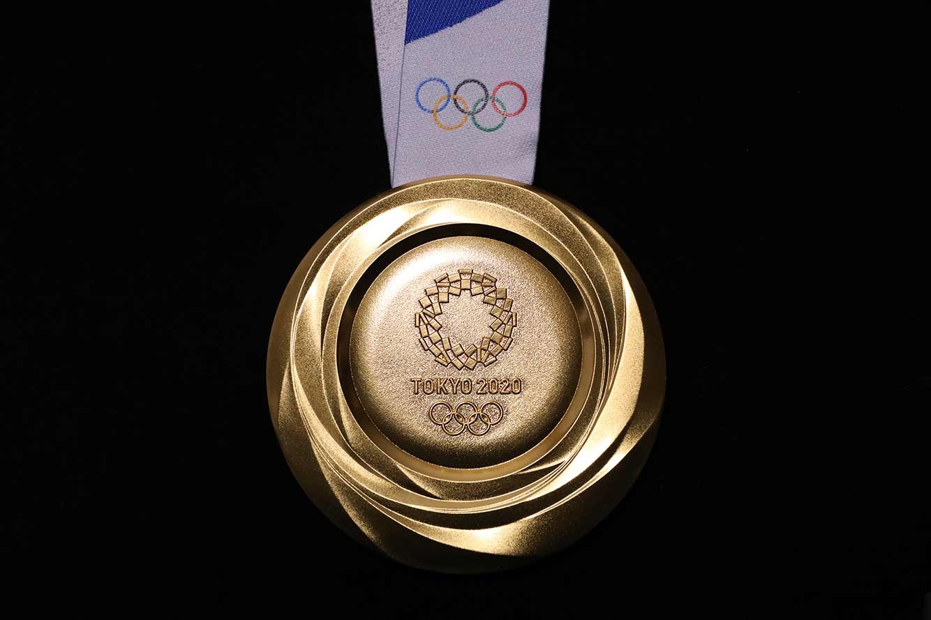 Организаторы Олимпийских игр в Токио показали медали из переработанной электроники (фото 2)