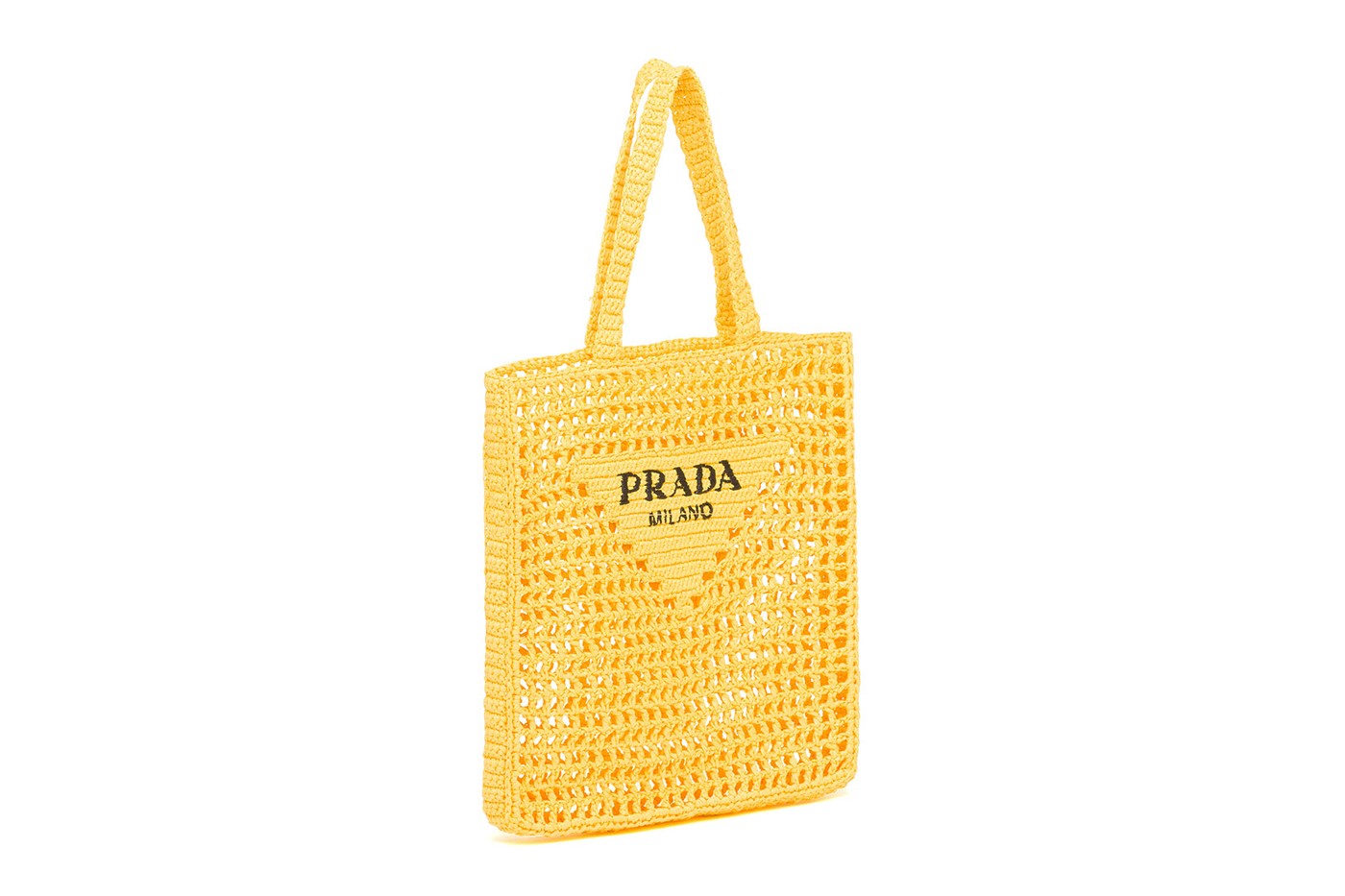 Prada выпустил вязаные сумки и топы-бра из денима для летнего отдыха (фото 6)