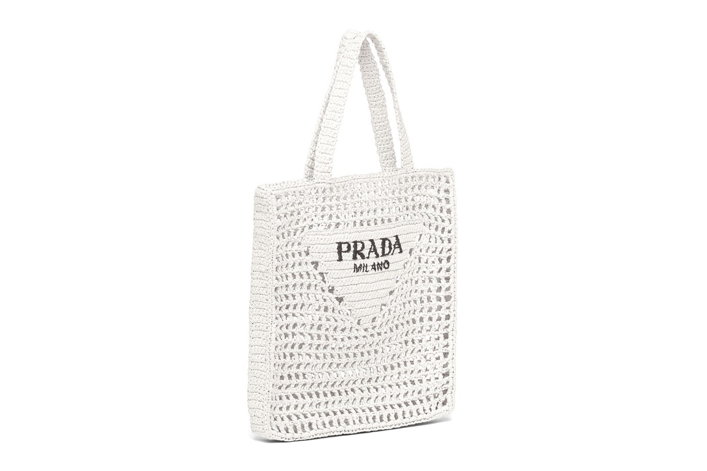 Prada выпустил вязаные сумки и топы-бра из денима для летнего отдыха (фото 8)