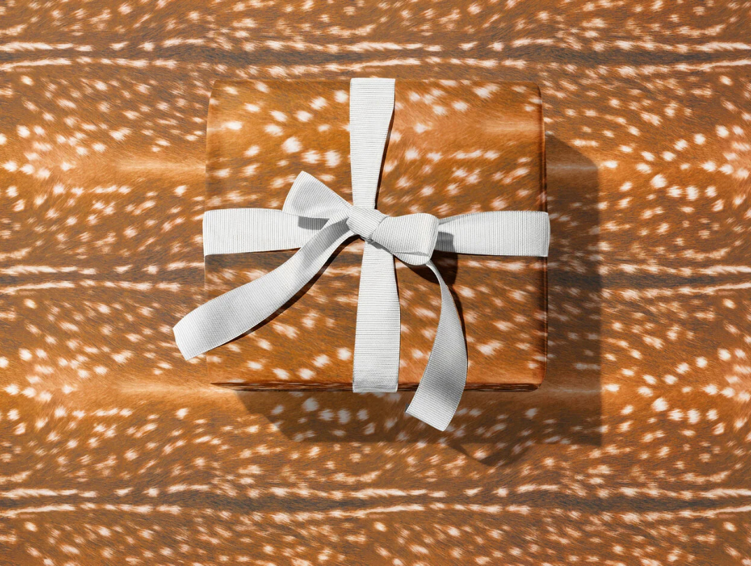 Встречают по обертке: варианты упаковки подарков к Новому году (фото 9)