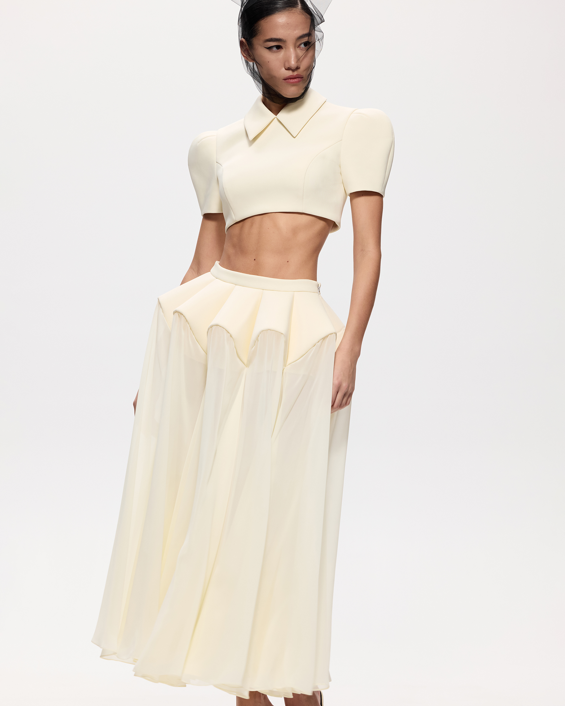 Вещь, без которой этой весной никуда? Эффектная юбка ниже колена. Вот 10 таких — от локальных брендов (фото 19)