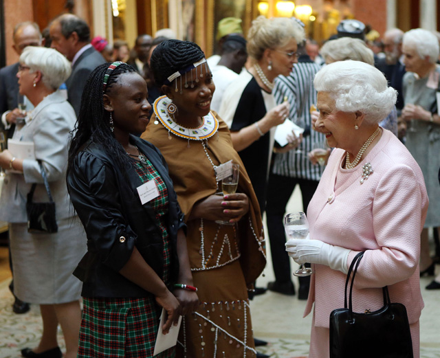 Дэвид Бекхэм на приеме в Букингемском дворце (фото 4)