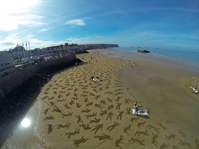 9 тысяч рисунков на песке (фото 3)