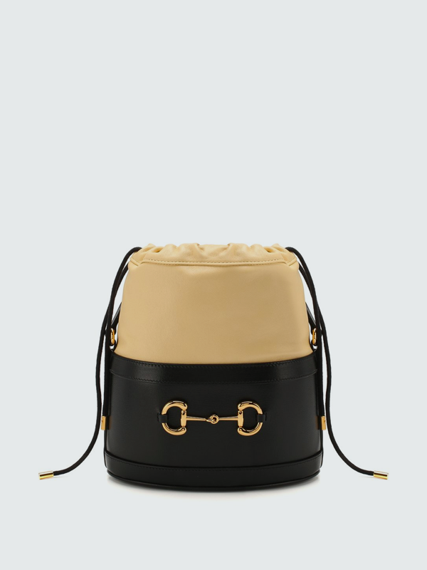 Необычная форма, яркий принт и экзотическая кожа: 15 сумок на весну и лето (фото 14)