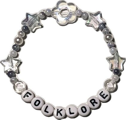 Змеи, браслеты дружбы и бесконечные пасхалки: азбука Тейлор Свифт (фото 12)