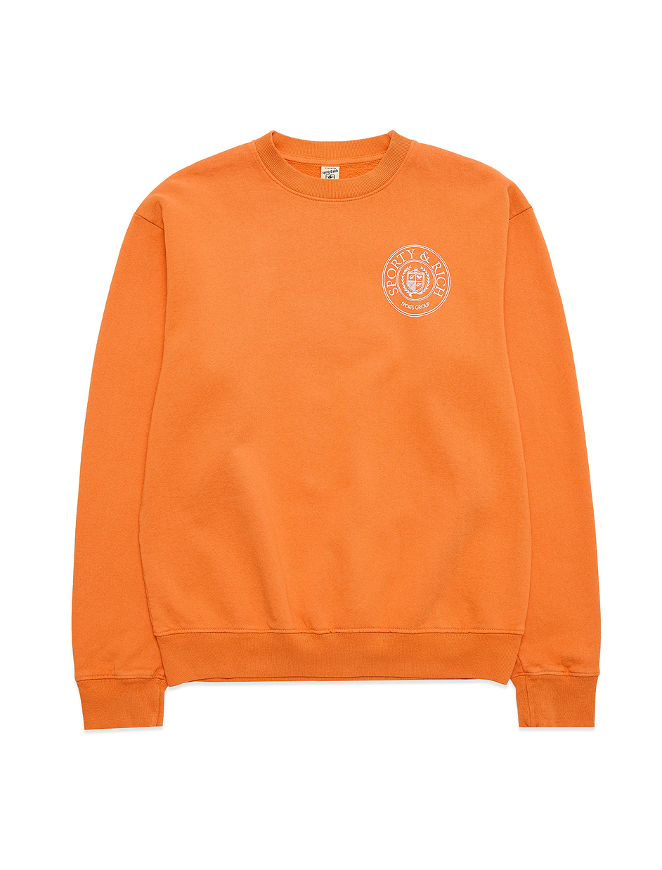 Оранжевый — хит сезона: 20 вещей в самом трендовом цвете Недель моды Милана и Парижа (фото 32)