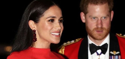 Меган Маркл появилась в красном кейпе на музыкальном фестивале