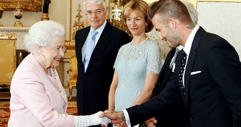 Дэвид Бекхэм на приеме в Букингемском дворце