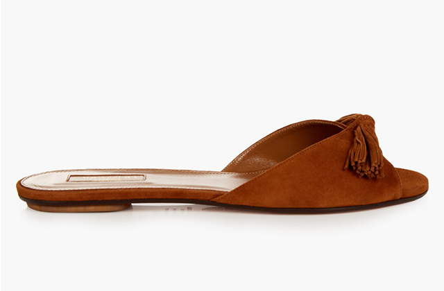 Aquazzura<p><a target=\"_blank\" href=\"http://www.matchesfashion.com/intl/products/Aquazzura-Wild-tassel-leather-slides-1046625\">matchesfashion.com</a></p>