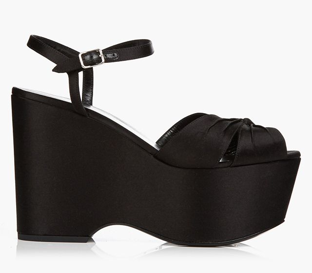 Saint Laurent<p><a target=\"_blank\" href=\"http://www.matchesfashion.com/intl/products/Saint-Laurent-Knot-front-satin-platform-sandals-1048201\">matchesfashion.com</a></p>