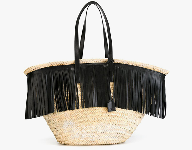 Saint Laurent<p><a target=\"_blank\" href=\"http://www.farfetch.com/uk/shopping/women/saint-laurent-fringed-straw-tote-item-11219947.aspx?storeid=9851&amp;from=search&amp;ffref=lp_pic_28_2_\">farfetch.com</a></p>