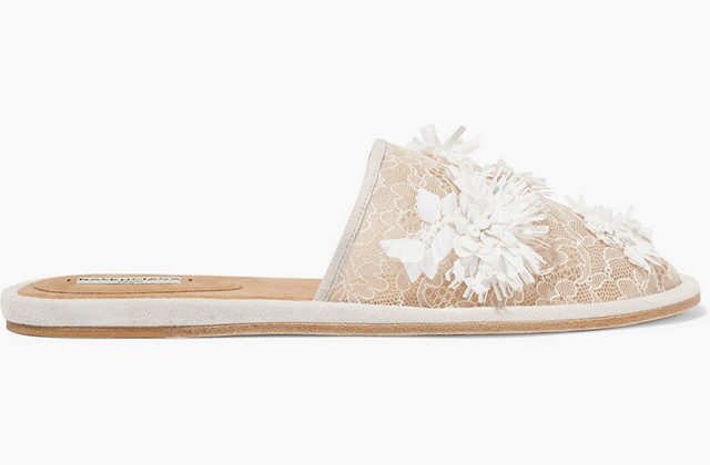 Balenciaga<p><a target=\"_blank\" href=\"https://www.net-a-porter.com/ua/en/product/691914/balenciaga/suede-trimmed-embellished-lace-slippers\">net-a-porter.com</a></p>