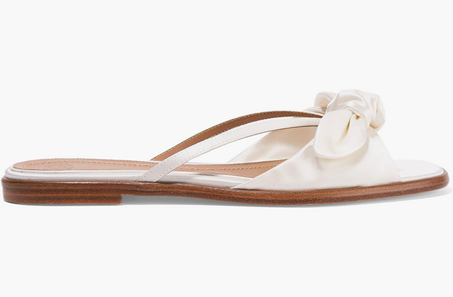 The Row<p><a target=\"_blank\" href=\"https://www.net-a-porter.com/ua/en/product/709772/the_row/april-bow-embellished-silk-satin-sandals\">net-a-porter.com</a></p>