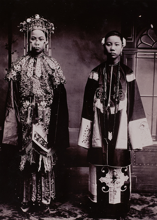 Девушки в китайских национальных костюмах. Фото: Michael Maslan/Corbis/VCG via Getty Images