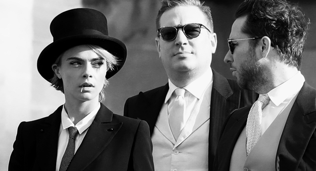 Кара Делевинь пришла на королевскую свадьбу в цилиндре и фраке